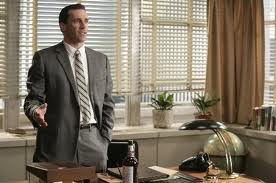don draper of mad men discussing student discounts
