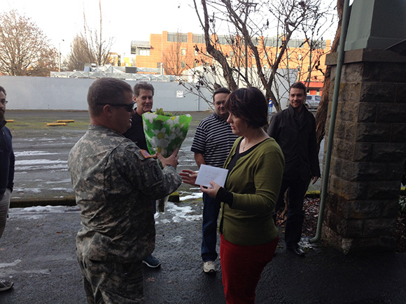 SheerID staff deliver donated goods for a Military family in need