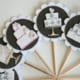 Bridal shower cupcake toppers arranged in a semi-circle.