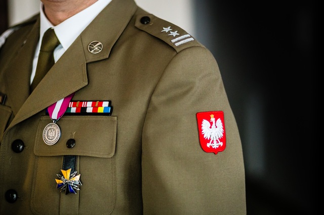 Polish soldier displays medals on his Land Forces dress uniform