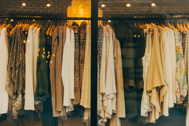 Retail clothing store with metal racks