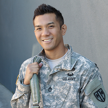 A service member smiling. The military community has 34 million buyers with $1 trillion in spending power.