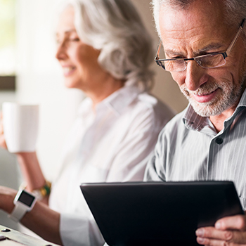 A senior redeeming a gated, exclusive offer. Seniors are willing to provide personal information to redeem an offer when they understand why the information is required.