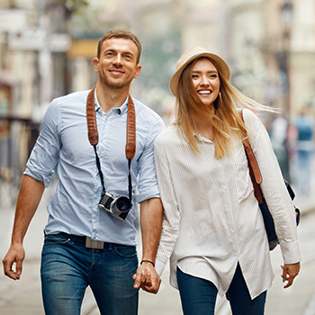 A couple enjoys a vacation they purchased through a gated offer as part of a campaign marketing to the military.