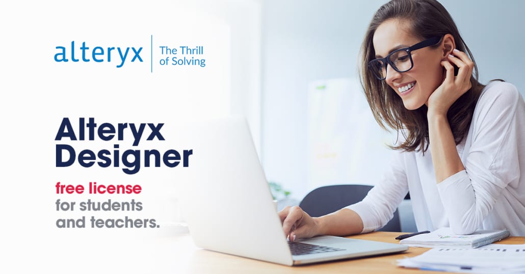 Woman at a laptop using software Alteryx provided free to build student and teacher customer loyalty.