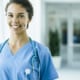 A photo of a smiling nurse. Marketing to nurses with exclusive offers is a great way to boost customer acquisition and loyalty.