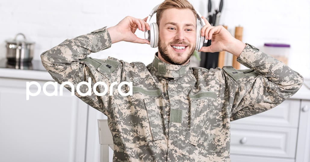 A smiling soldier listens to Pandora. The streaming media company is acquiring loyal subscribers by marketing to the military with exclusive discounts on their premium plan.