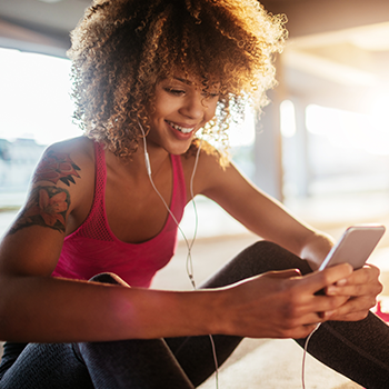 A female responding to Pandora's marketing to the military by subscribing to the service on her iPhone.