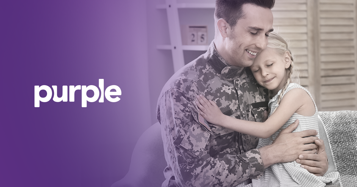 A smiling male soldier hugging his daughter, happy they receive a discount from companies that market to the military.