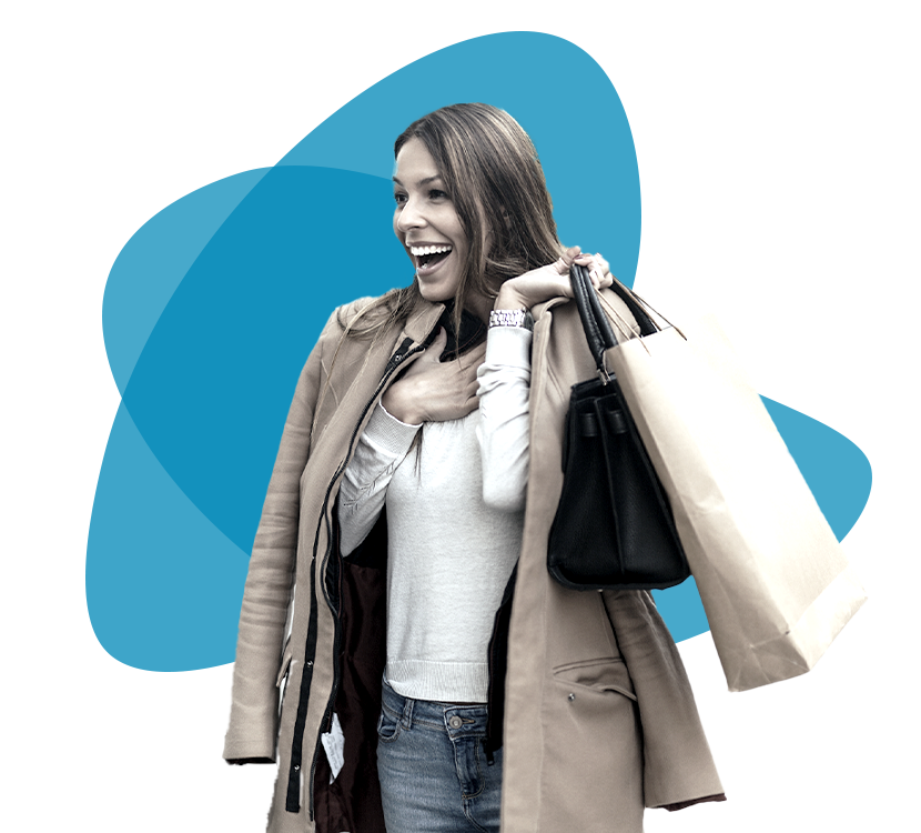 Female with shopping bags going on a retail shopping spree using SheerID
