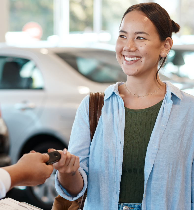 PICTURE OF SOMEONE RETURNING A CAR, i.e. handing over keys or clothes