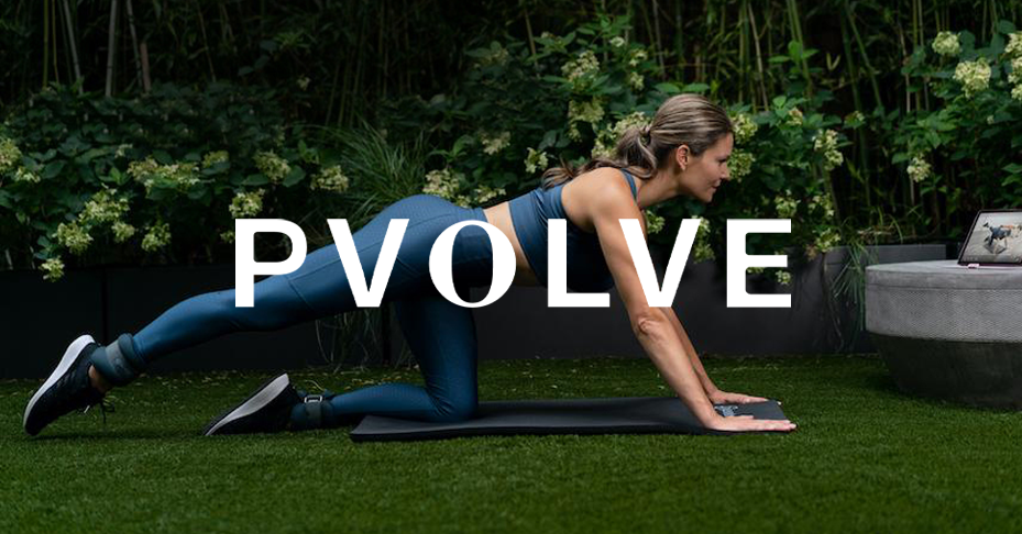 Woman doing yoga behind PVOLVE logo