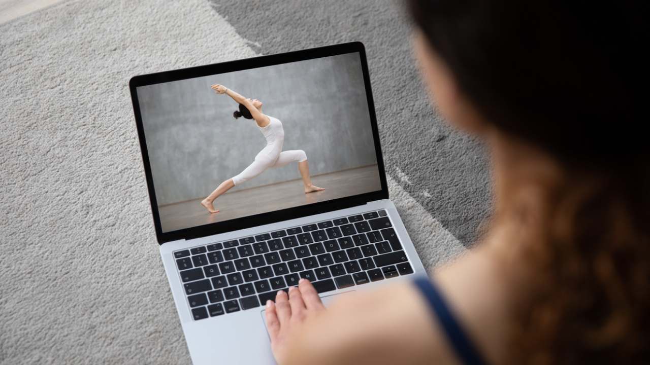 Over shoulder point-of-view of woman looking up workout.