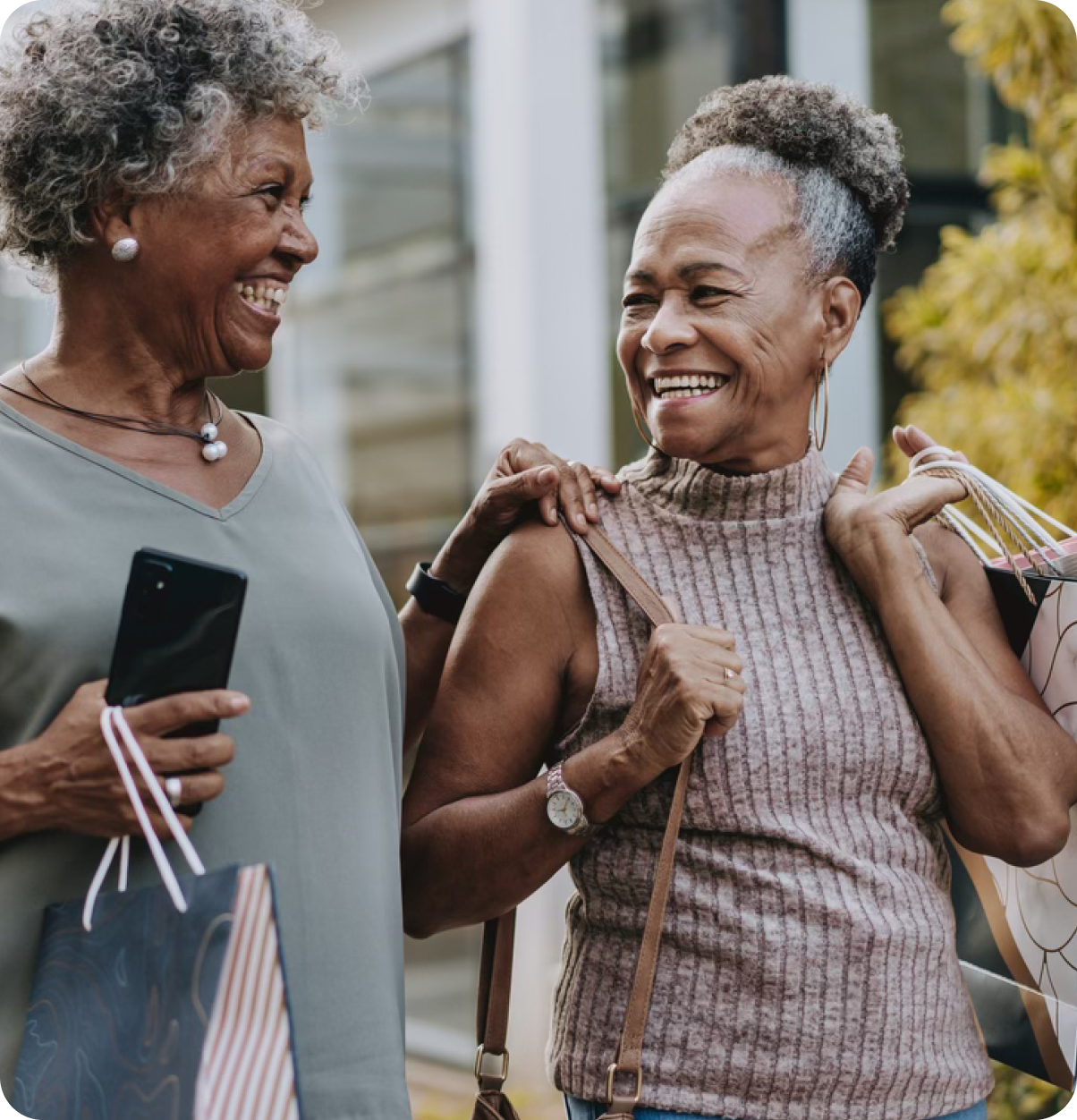 Older adults walking and smiling.