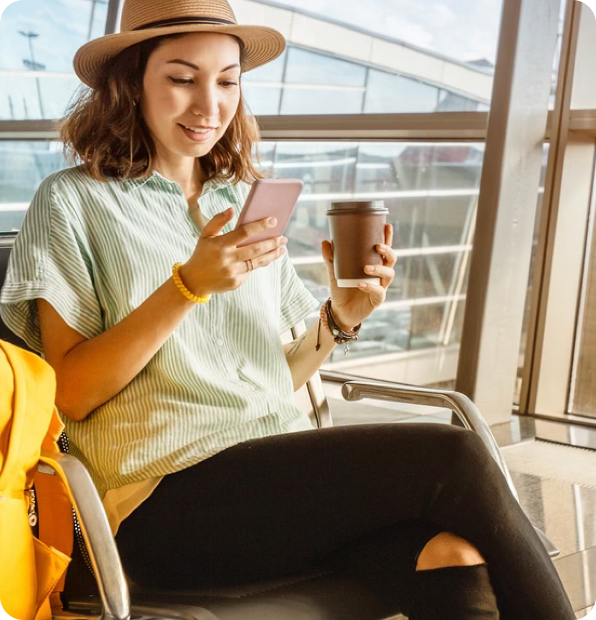 Woman traveler using phone.