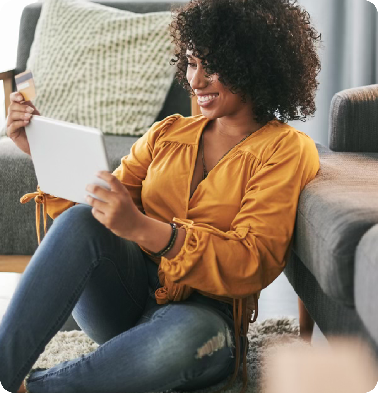 Woman at home makes online purchase with tablet.