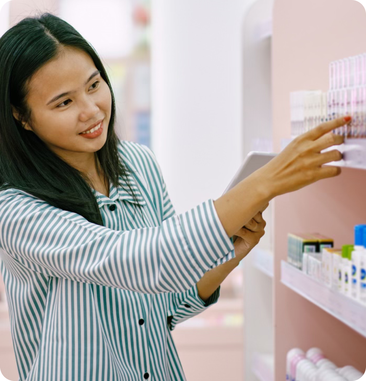 Woman browses items at store.