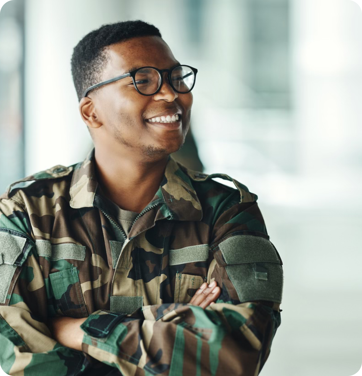 Military member standing proudly.