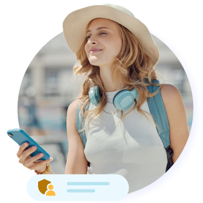 Student smiling wearing a hat and headphones.