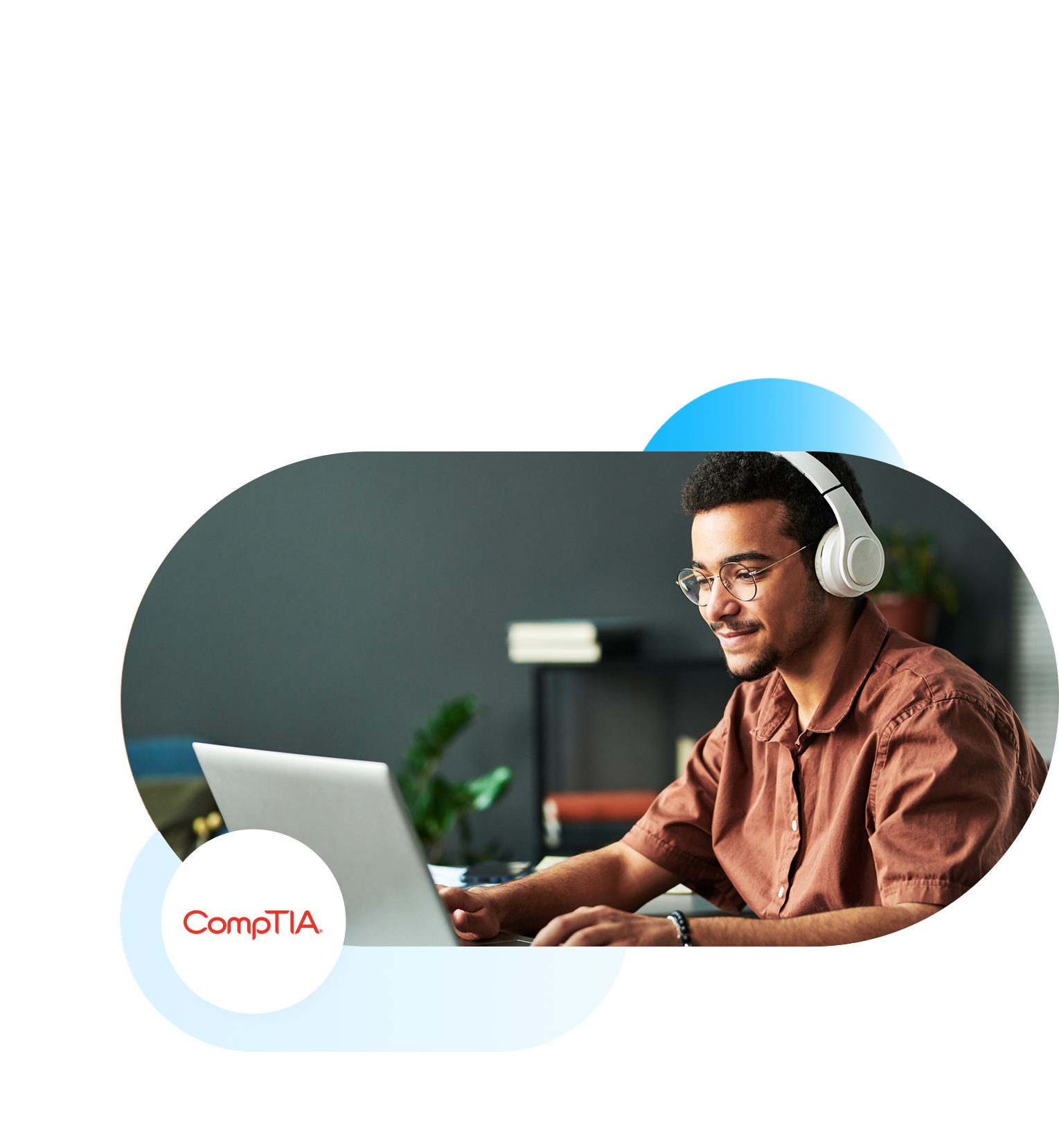 CompTIA logo with man wearing headphones at computer.